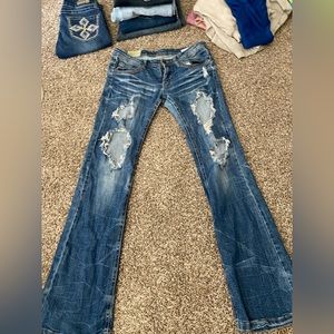 Distressed bootcut jeans size 30